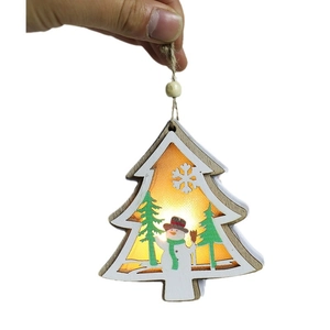 Lighted wooden Christmas tree pendant with warm LED glow and snowman carving