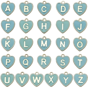 Detail of 26 light blue enamel heart letter charms with gold finish for DIY jewelry