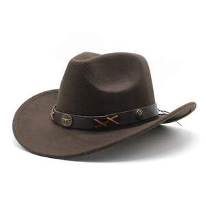 Detail of dark brown felt cowboy hat with leather band and vintage metal buckle