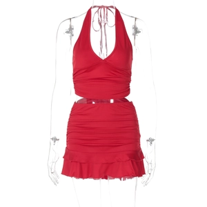 Detail of red halter two-piece set featuring V-neck top and ruffled mini skirt details
