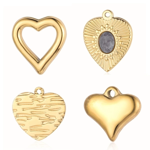 Set of four gold stainless steel heart pendants with natural stone and textured finish