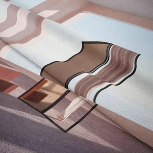Detailed macro view of bohemian tapestry fabric with geometric patterns and soft texture