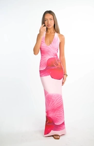 Detail of floral halter neck maxi dress featuring pink orchid print and deep V-neck design