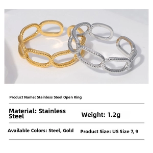 Detailed close-up of adjustable chain rings in gold and silver stainless steel