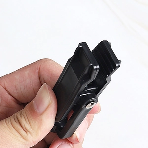 Close-up of durable black plastic clip with strong metal spring and anti-slip grip grooves