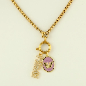 Detailed view of 18k gold necklace with HOME lettering and pink enamel butterfly charm