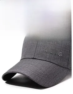 Detailed close-up of dark grey textured suit fabric baseball cap with CLASS embroidery
