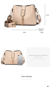 Beige bucket bag size detail with leather texture and jacquard love strap display