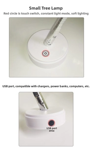 Detail of white tree lamp base with touch power switch and side USB charging port