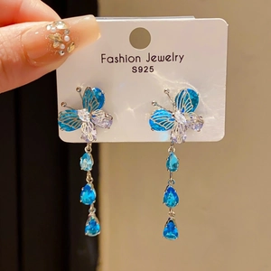 Detail of blue butterfly crystal earrings with water drop tassel and S925 silver needle