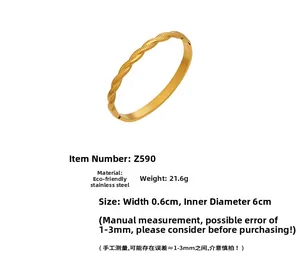 Detail of twisted rope gold bracelet made of polished 18k stainless steel