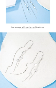 Detail of S925 sterling silver star tassel ear threads with polished hanging charms