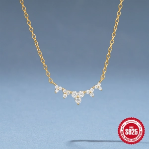 Minimalist S925 sterling silver gold necklace with curved cluster of sparkling cubic zirconia