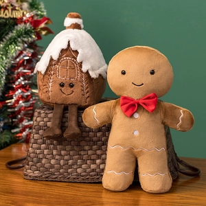 Christmas plush set featuring a brown gingerbread man and house for holiday decor
