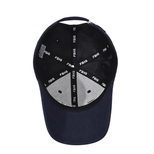 Interior view of navy blue baseball cap with FBXS stitching and adjustable metal buckle