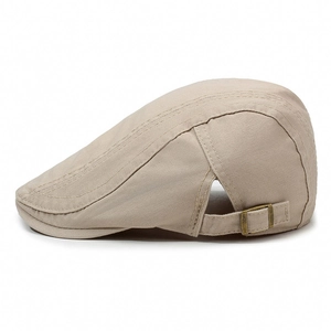 Beige cotton twill beret with adjustable bronze buckle and reinforced stitching