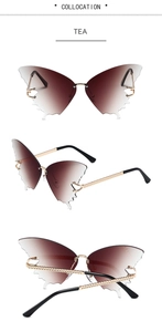 Detail of gradient tea lenses with wave-cut edges and gold chain-texture metal temples