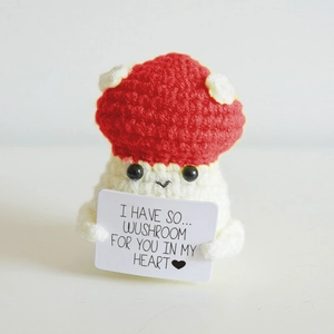 Detail of crochet mushroom plush with punny message card for a romantic gift