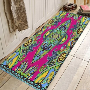 Detailed close-up of bohemian runner rug with paisley mandala print on light wood floor