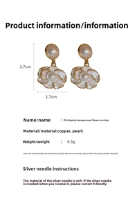 Detail view of enamel flower earrings with baroque pearls and gold plating measurements
