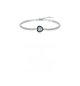 Macro detail of S925 silver tennis bracelet with black enamel heart and cubic zirconia