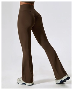 Detail shot of brown high-waisted yoga flare pants showing the scrunch butt lift feature