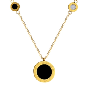 Minimalist gold titanium necklace with black Roman numeral round pendants on white background
