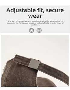 Close-up of adjustable metal buckle on a distressed brown washed cotton baseball cap