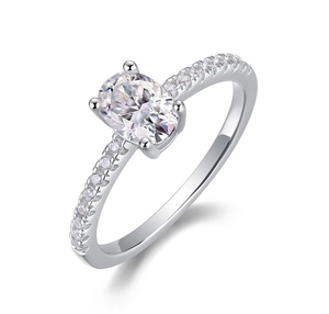 Macro detail of oval cut moissanite ring with side accent diamonds in 925 silver