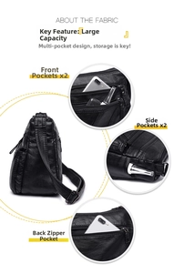 Detailed view of black washed leather bag with multi-pocket layout and front zipper design