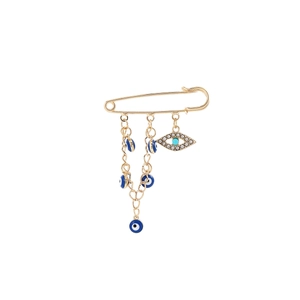 Detail of gold brooch featuring blue evil eye charms and sparkling diamond fringe tassel
