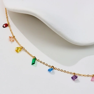 Gold stainless steel necklace featuring multi-colored zircon pendants in assorted shapes