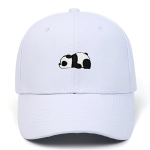 Close-up of high-quality panda embroidery on a white cotton baseball cap with neat stitching