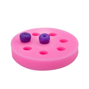 Pink silicone fruit donut mold with 8 cavities for cake decorating and DIY crafts