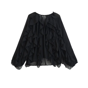Detail of black long-sleeve chiffon blouse with elegant layered ruffles and sheer texture
