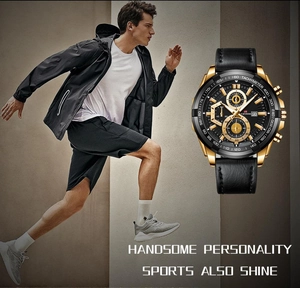 Close-up of golden sports watch with black leather strap and multi-dial chronograph display