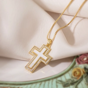 Elegant 18K gold plated cross necklace with white inlay and sparkling zircon stones