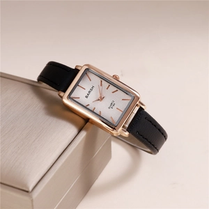Minimalist square quartz watch for women with gold case and slim black leather strap