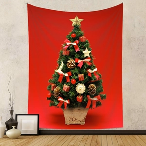 Dettaglio di un arazzo natalizio rosso festivo con decorazioni natalizie classiche