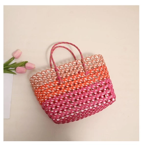 Top view of colorful hollow woven tote bag with pink and orange gradient mesh details