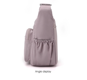 Side view of grey purple nylon crossbody bag showing elastic pocket and zipper details