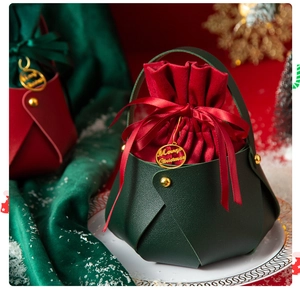 Green and red PU leather Christmas gift bags with gold Merry Christmas charms