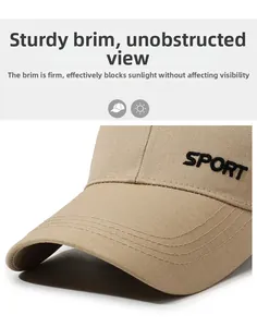 Close-up of khaki baseball cap featuring stiff brim and SPORT embroidery detail