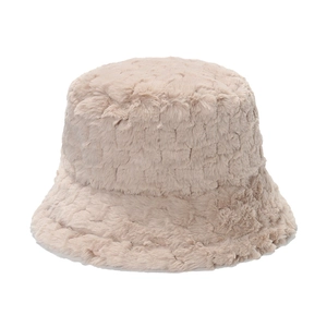 Macro shot of thick plush beige winter bucket hat with textured checkered faux fur pattern