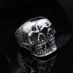 Punk style stainless steel skull ring with three-sided skull design and mirror reflection