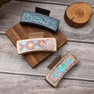 Three western cowboy style leather pattern hair claws with floral and turquoise textures