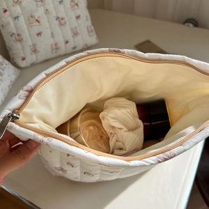 Quilted cotton makeup bag interior with bear prints and spacious storage view