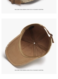 Detail of vintage khaki cotton baseball cap with adjustable metal buckle and inner lining