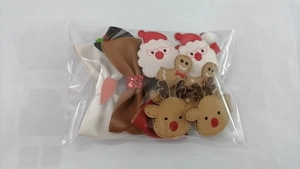 Christmas hair clips set with faux leather bows, Santa Claus, gingerbread man and reindeer