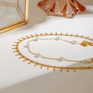 Double-layered 18K gold plated stainless steel anklet featuring natural freshwater pearls